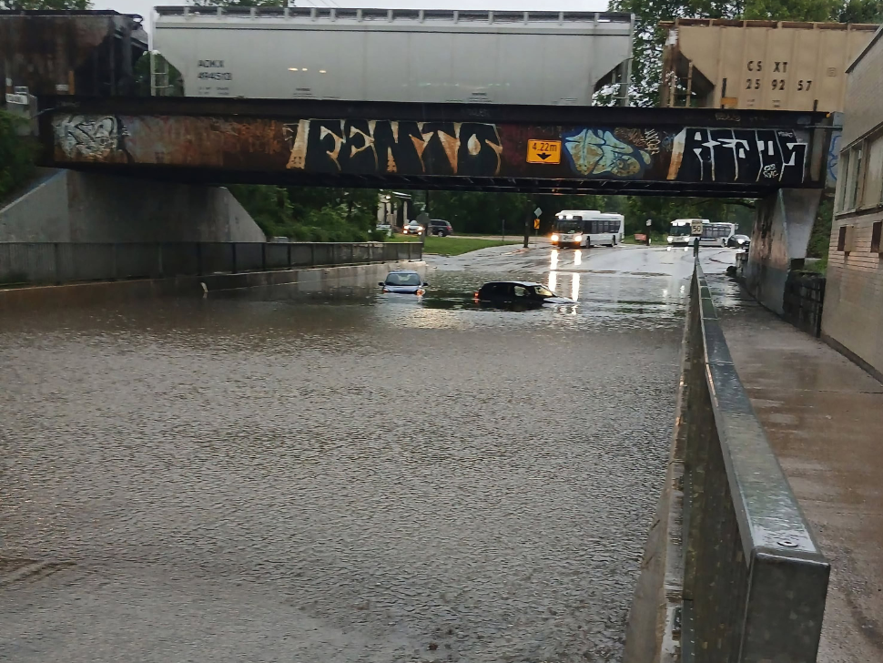 Two vehicles submerged in flood waters under the Higgins Underpass following storm on Tuesday, June 9, 2026. (Chayna Lowe)